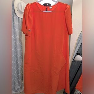 Women’s beautiful orange dress with pockets